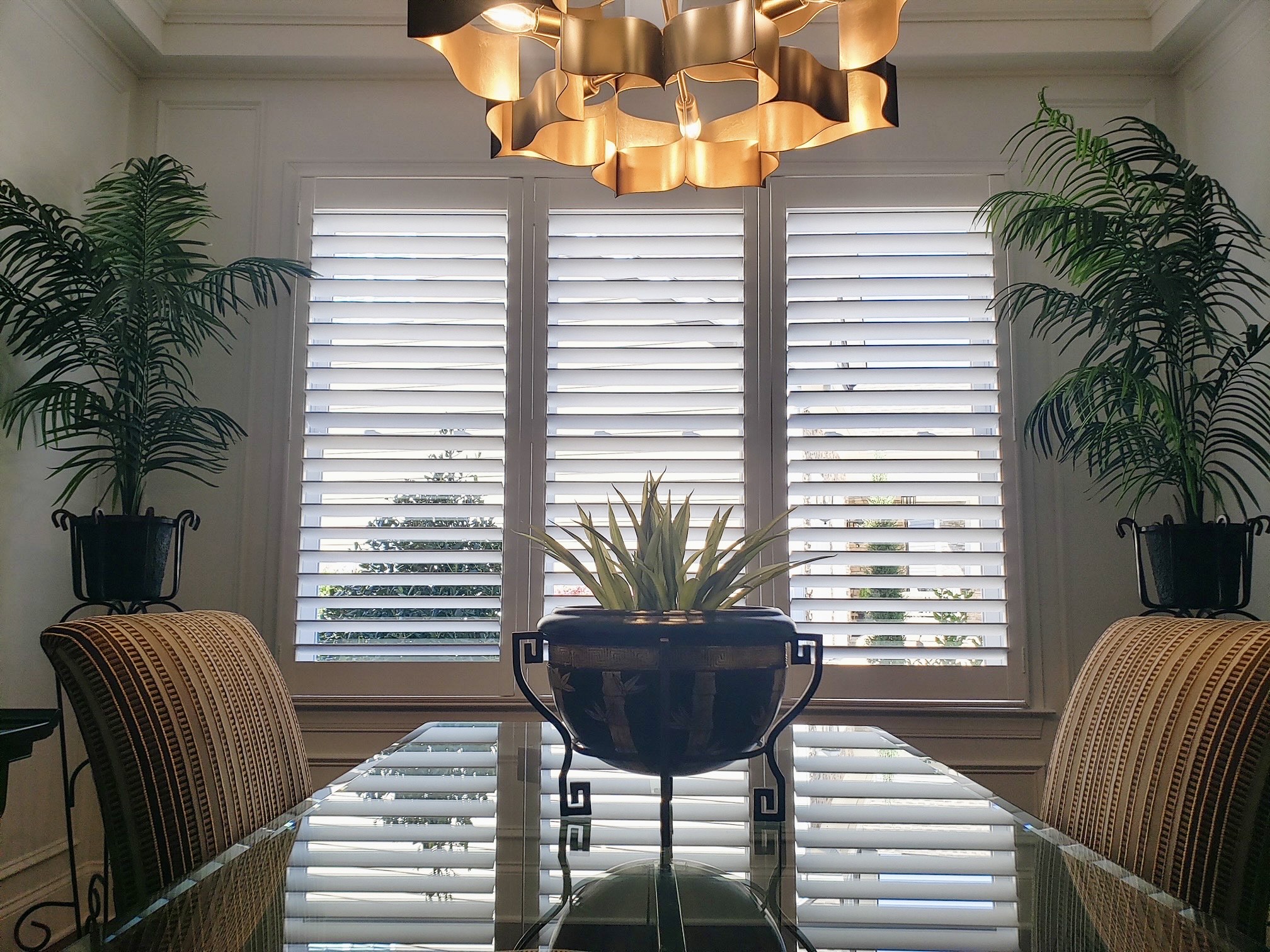 Wood plantation shutters with 3 1/2” louvers and a hidden tilt feature